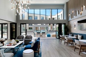 Exclusive club room featuring an indoor-outdoor lounge
